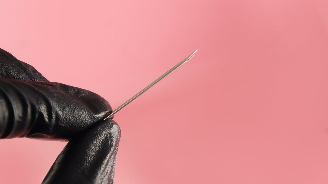 Piercing with a needle vs. piercing guns: what is the best choice?