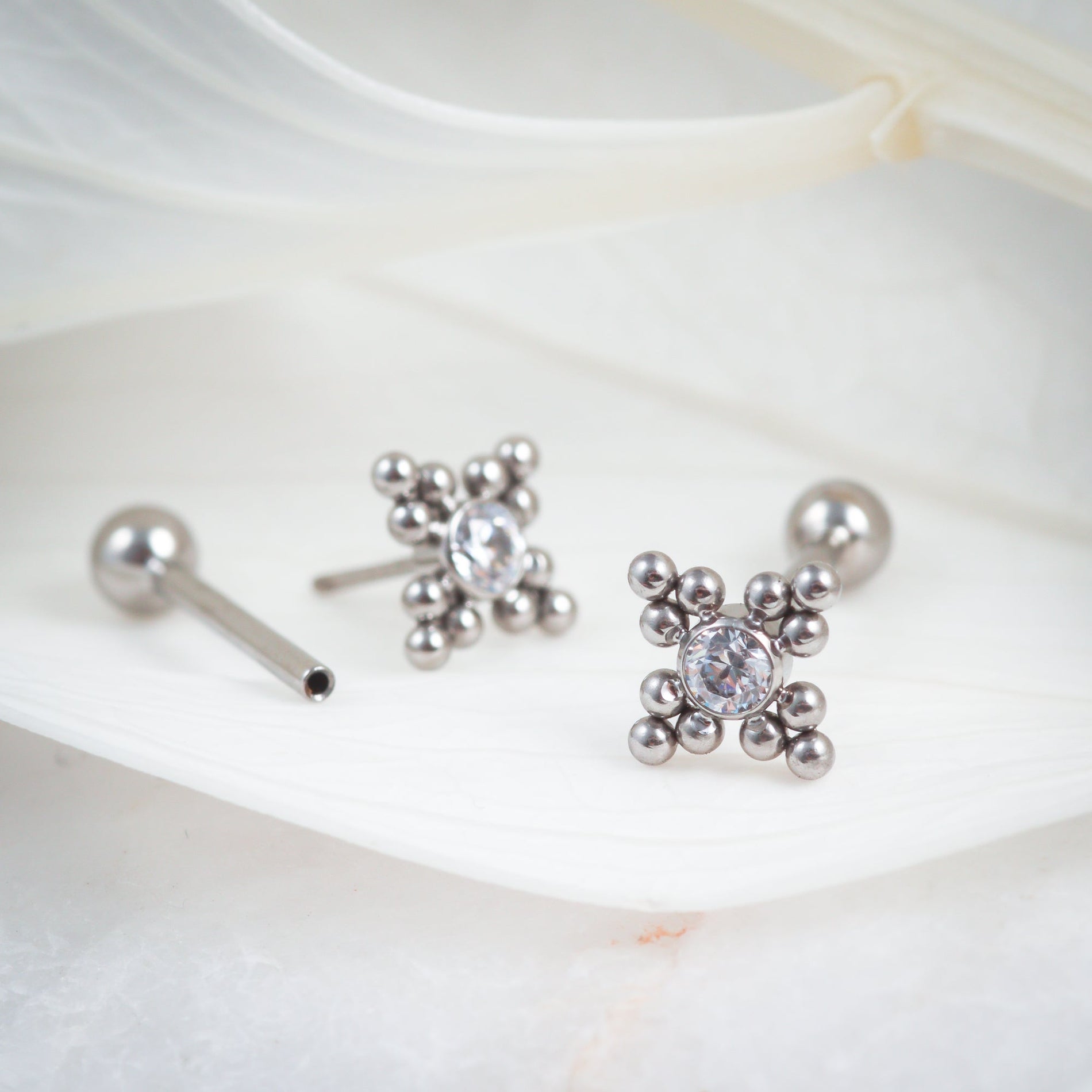 Threadless Piercings - adjusting and inserting jewelry