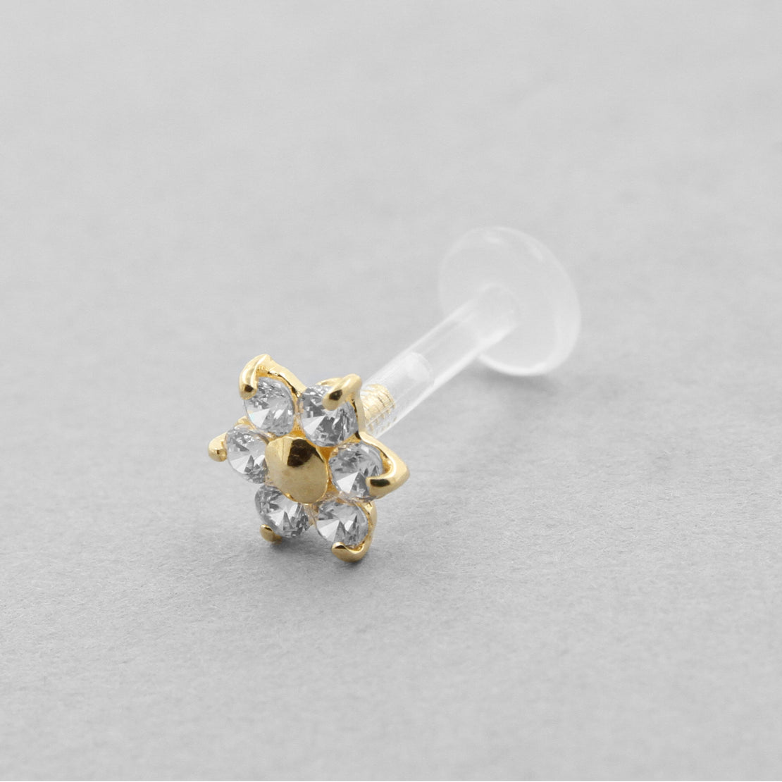 Bioplast-Labret mit 18-Karat-Gold-Blume und Zirkonia