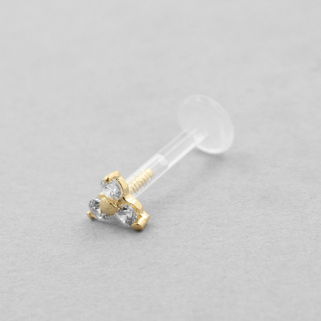 18 Karat Gold Bioplast Labret With Gold Zirconia Trinity